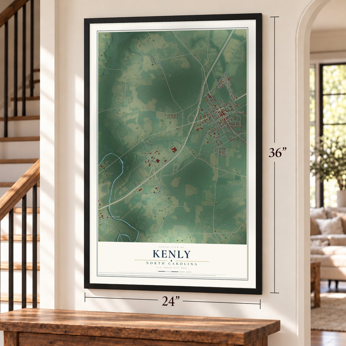 Kenly, North Carolina map, 24 x 36 inch print in a black frame by a staircase