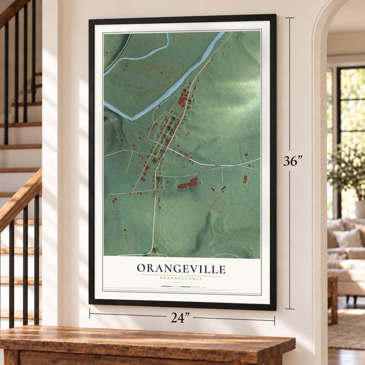 Orangeville, Pennsylvania map, 24 x 36 inch print in a black frame by a staircase