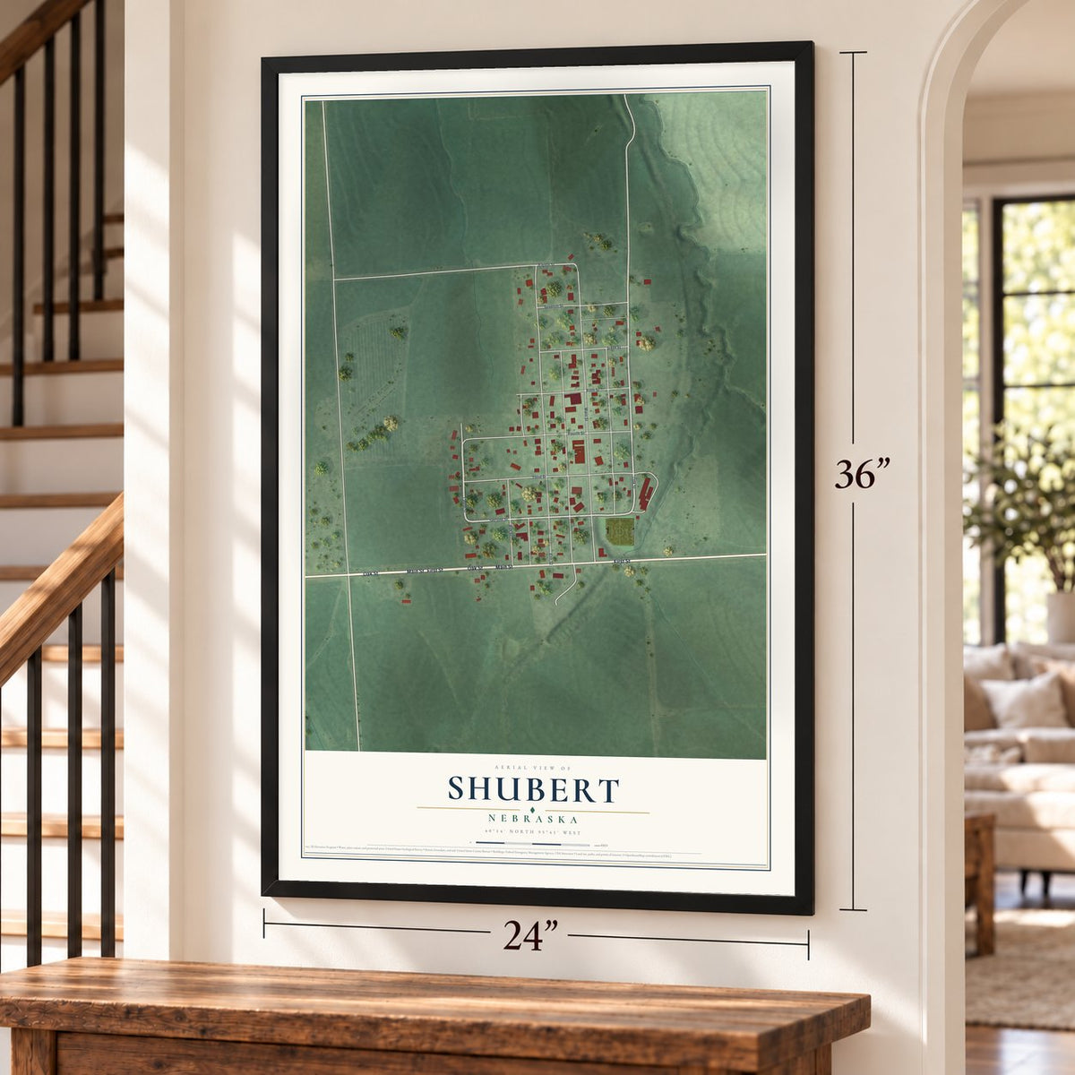 Shubert, Nebraska map, 24 x 36 inch print in a black frame by a staircase