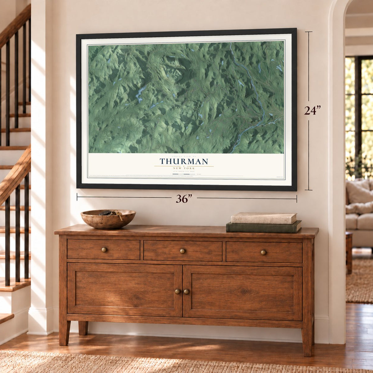 Thurman, New York map, 24 x 36 inch print in a black frame above a dresser by a staircase