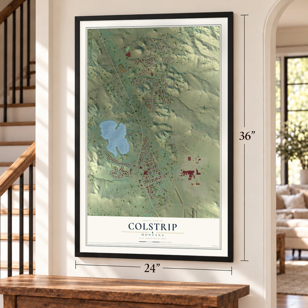 Colstrip, Montana map, 24 x 36 inch print in a black frame by a staircase