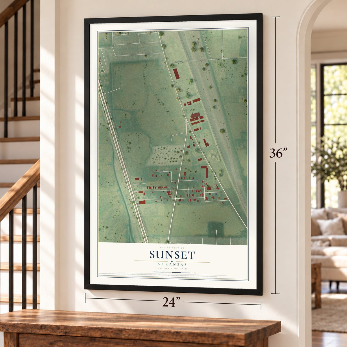 Sunset, Arkansas map, 24 x 36 inch print in a black frame by a staircase