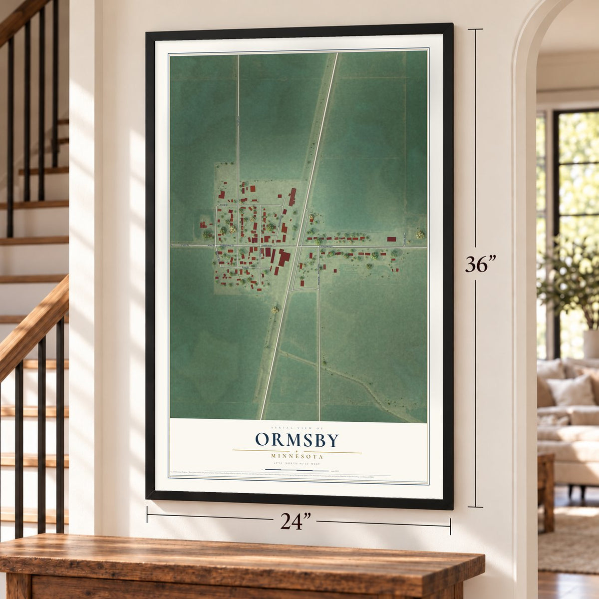 Ormsby, Minnesota map, 24 x 36 inch print in a black frame by a staircase
