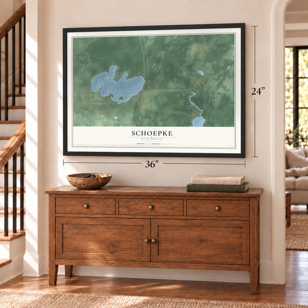 Schoepke, Wisconsin map, 24 x 36 inch print in a black frame above a dresser by a staircase