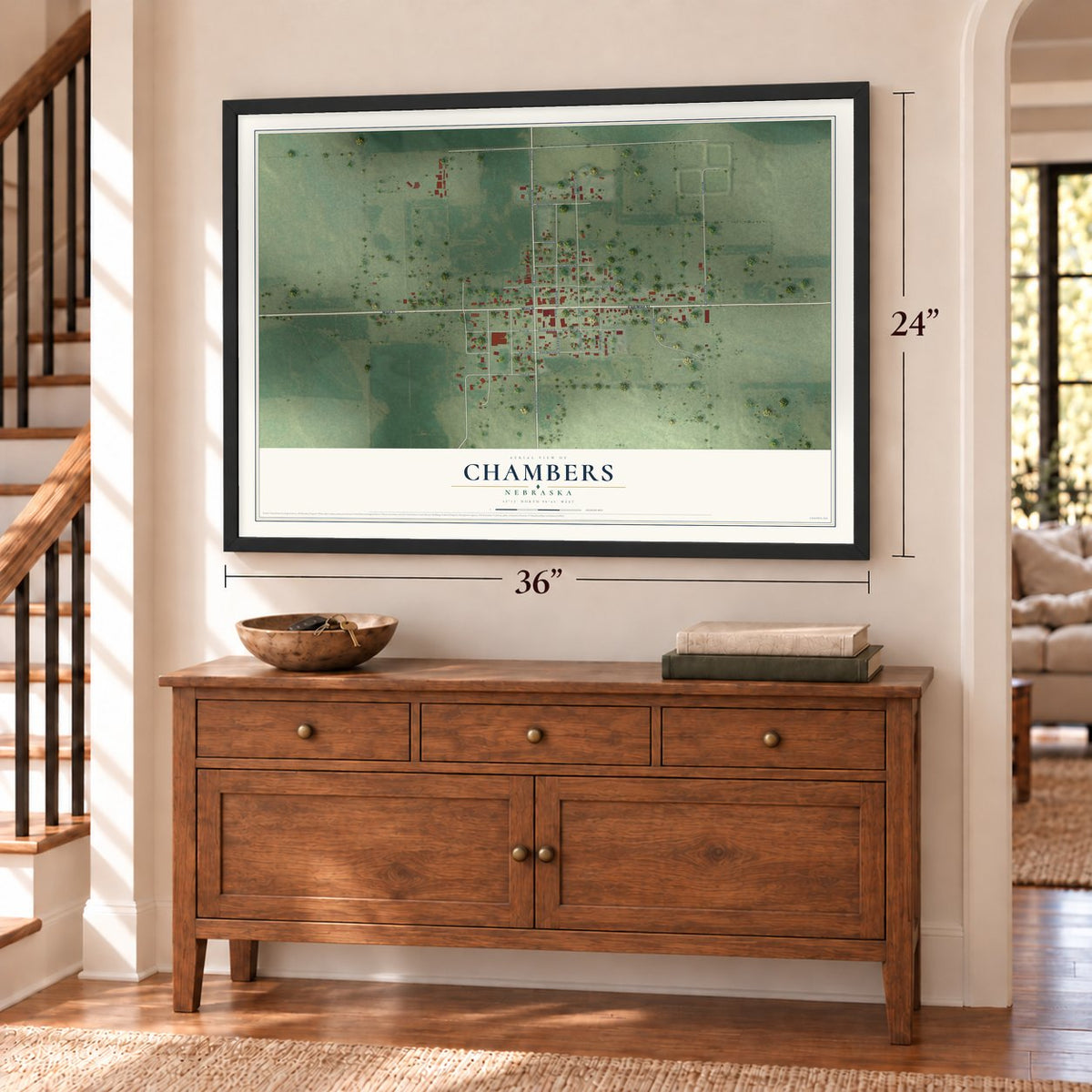 Chambers, Nebraska map, 24 x 36 inch print in a black frame above a dresser by a staircase