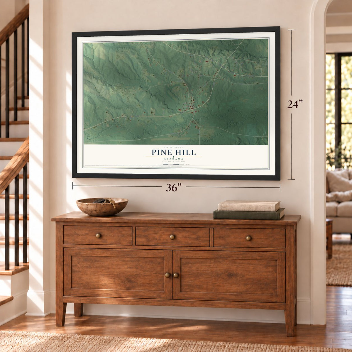 Pine Hill, Alabama map, 24 x 36 inch print in a black frame above a dresser by a staircase