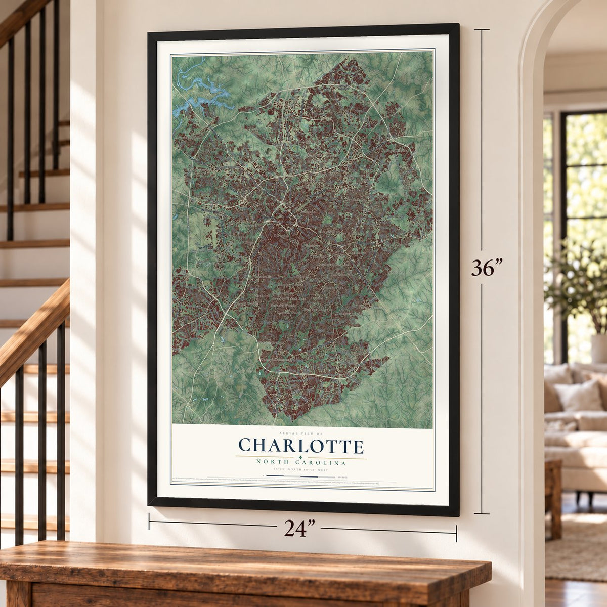 Charlotte, North Carolina map, 24 x 36 inch print in a black frame by a staircase