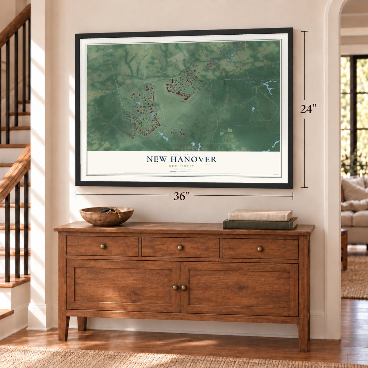 New Hanover, New Jersey map, 24 x 36 inch print in a black frame above a dresser by a staircase