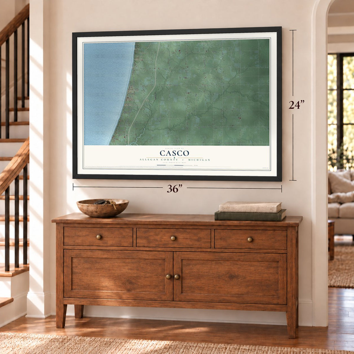 Casco, Allegan County, Michigan map, 24 x 36 inch print in a black frame above a dresser by a staircase