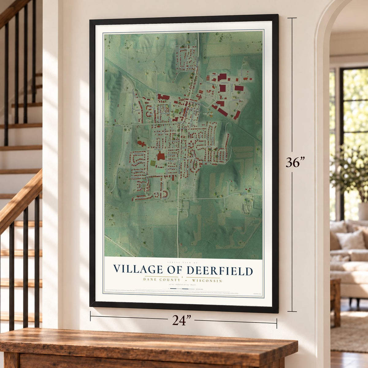 Deerfield, Wisconsin map, 24 x 36 inch print in a black frame by a staircase