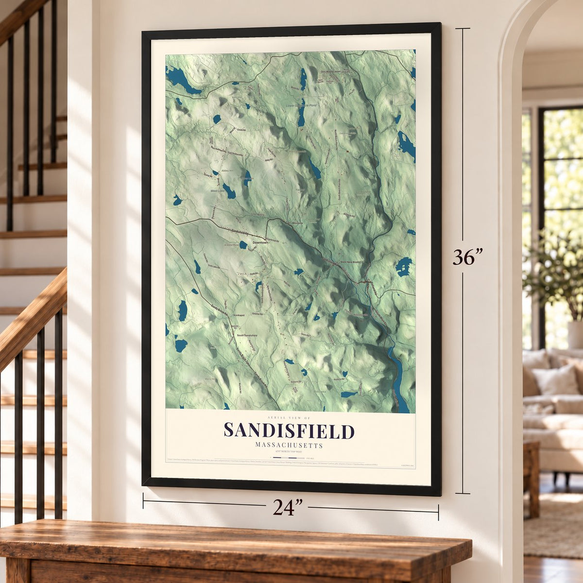 Sandisfield, Massachusetts map, 24 x 36 inch print in a black frame by a staircase