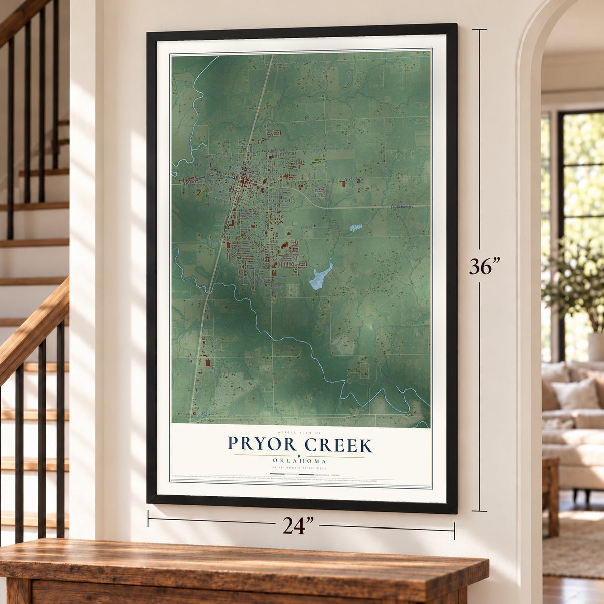 Pryor Creek, Oklahoma map, 24 x 36 inch print in a black frame by a staircase
