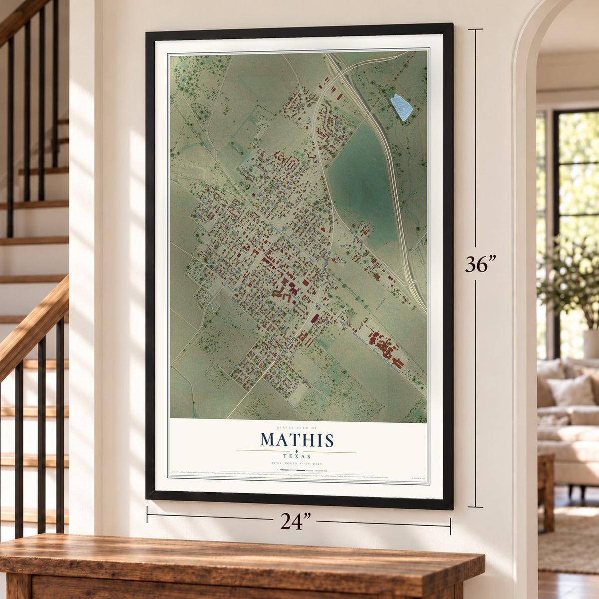 Mathis, Texas map, 24 x 36 inch print in a black frame by a staircase