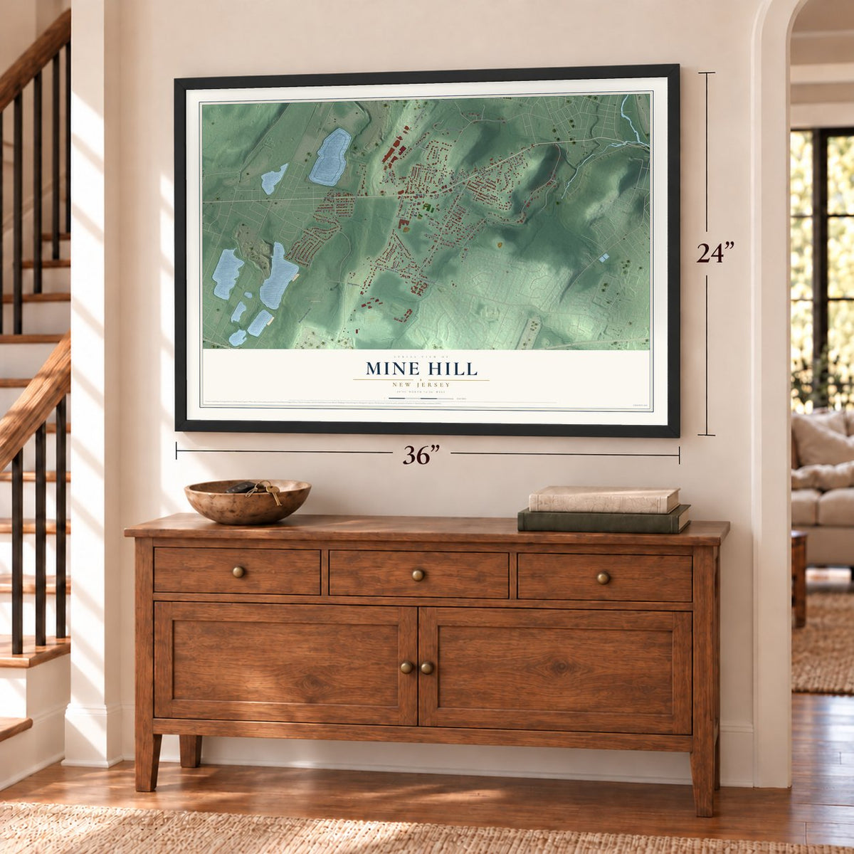Mine Hill, New Jersey map, 24 x 36 inch print in a black frame above a dresser by a staircase