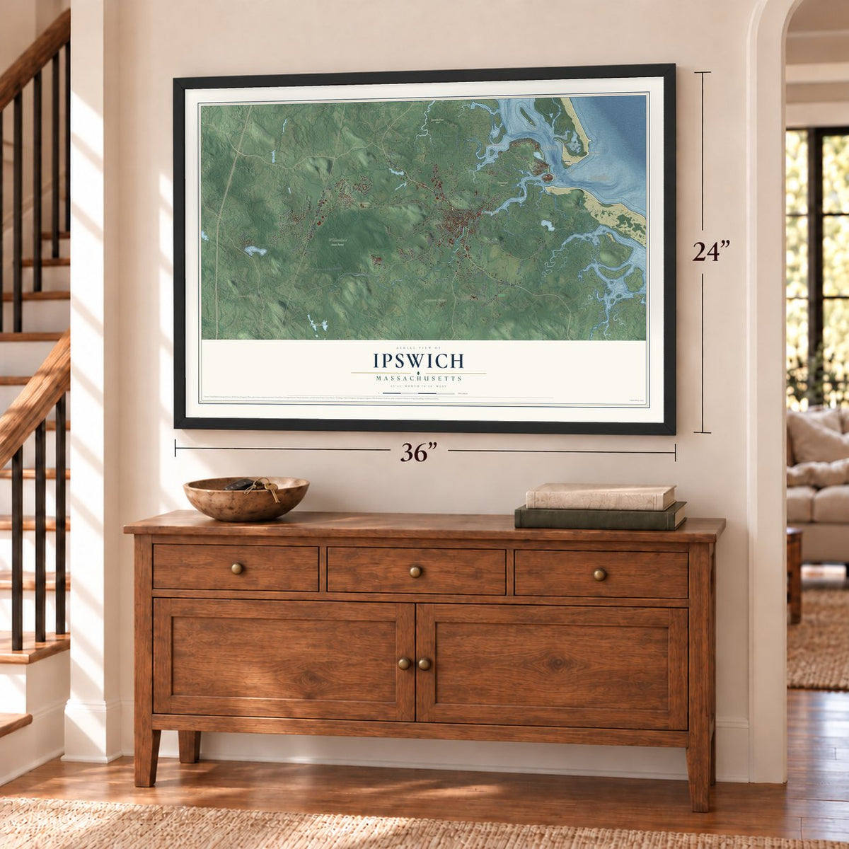 Ipswich, Massachusetts map, 24 x 36 inch print in a black frame above a dresser by a staircase
