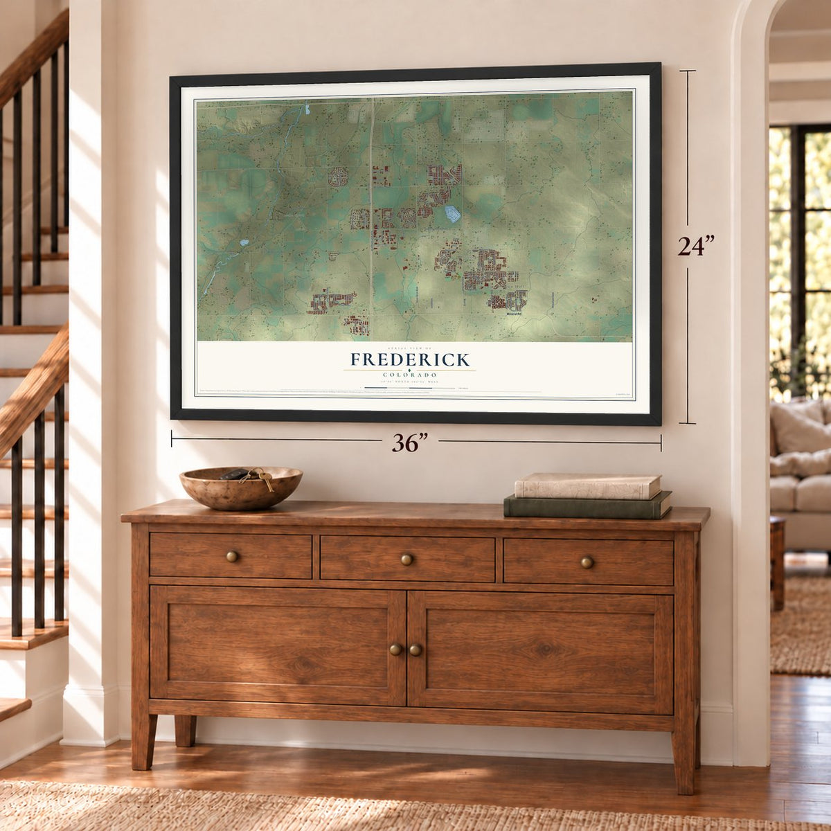 Frederick, Colorado map, 24 x 36 inch print in a black frame above a dresser by a staircase