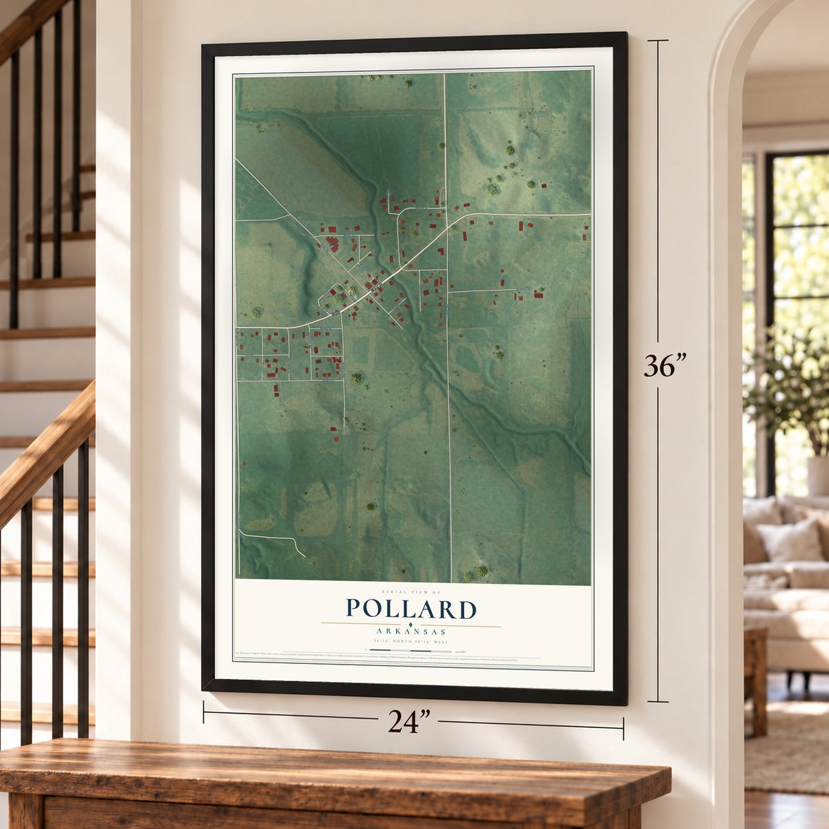 Pollard, Arkansas map, 24 x 36 inch print in a black frame by a staircase