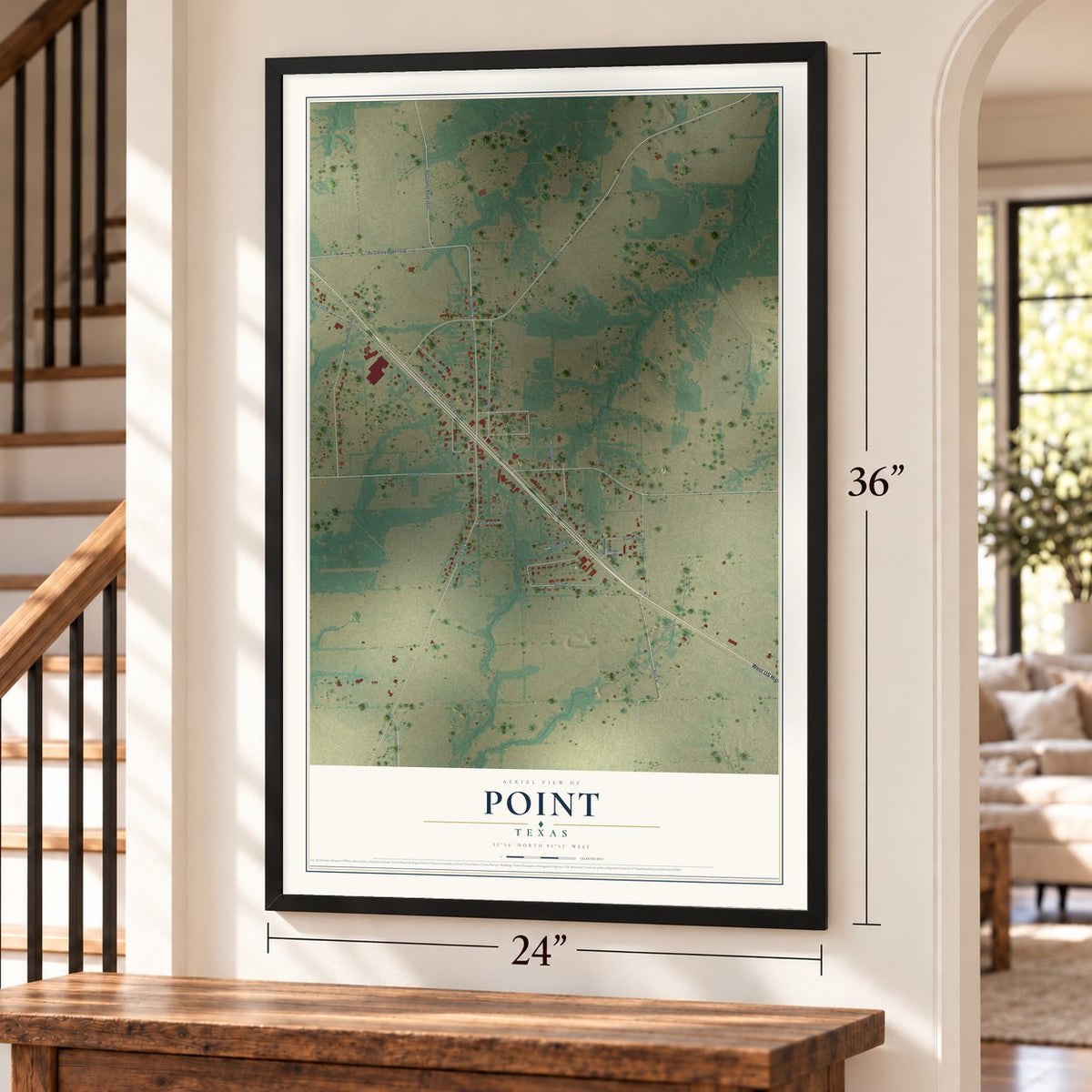 Point, Texas map, 24 x 36 inch print in a black frame by a staircase
