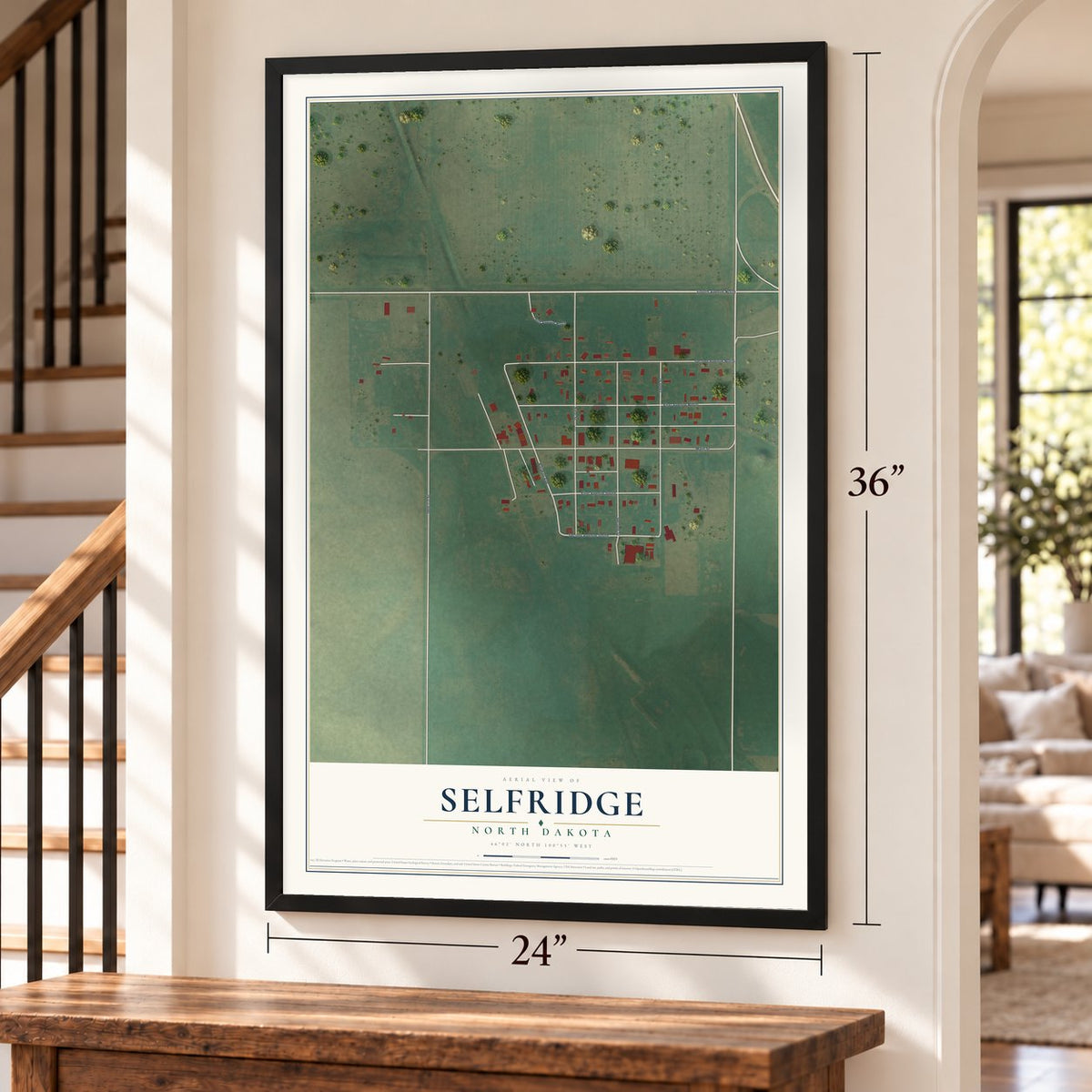 Selfridge, North Dakota map, 24 x 36 inch print in a black frame by a staircase