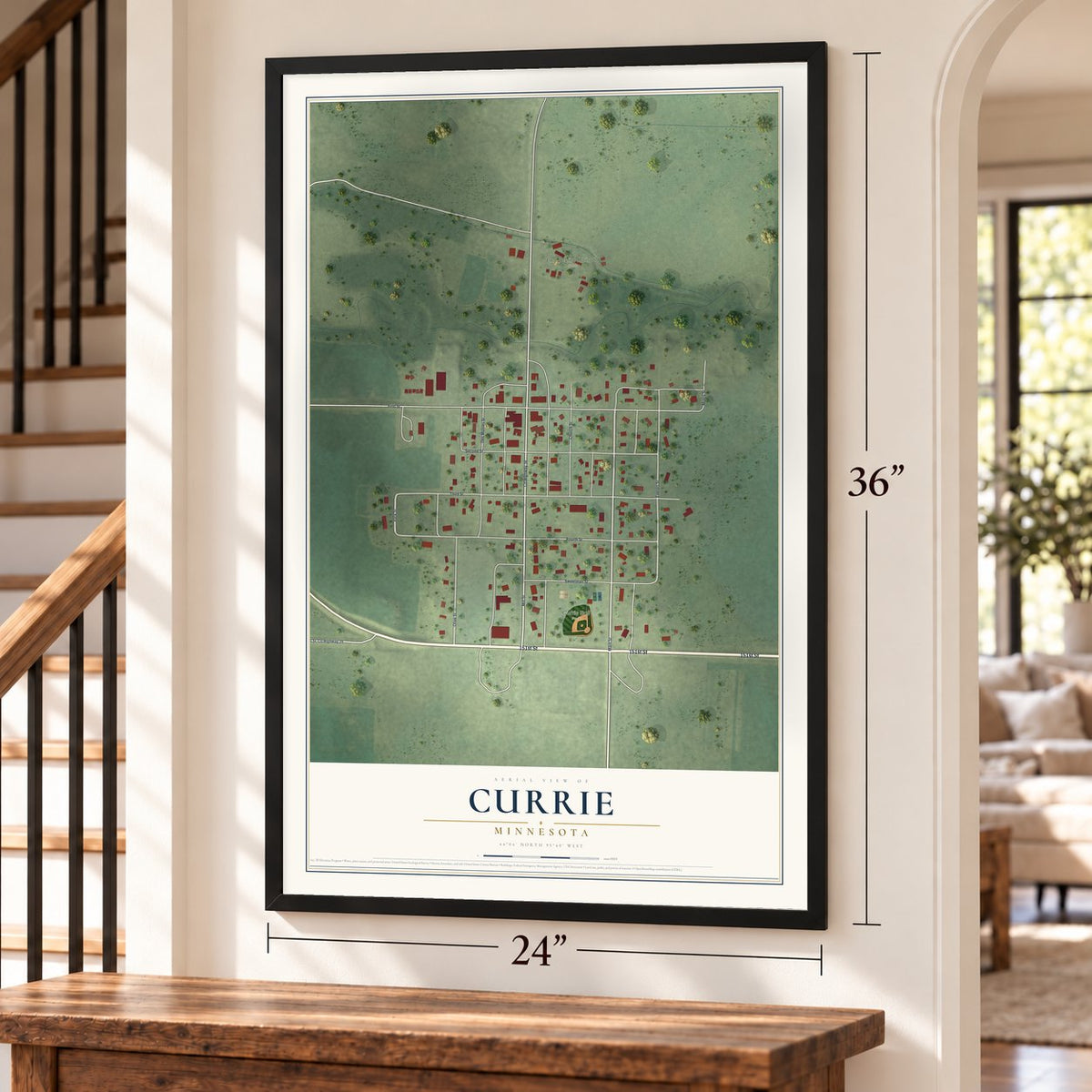 Currie, Minnesota map, 24 x 36 inch print in a black frame by a staircase