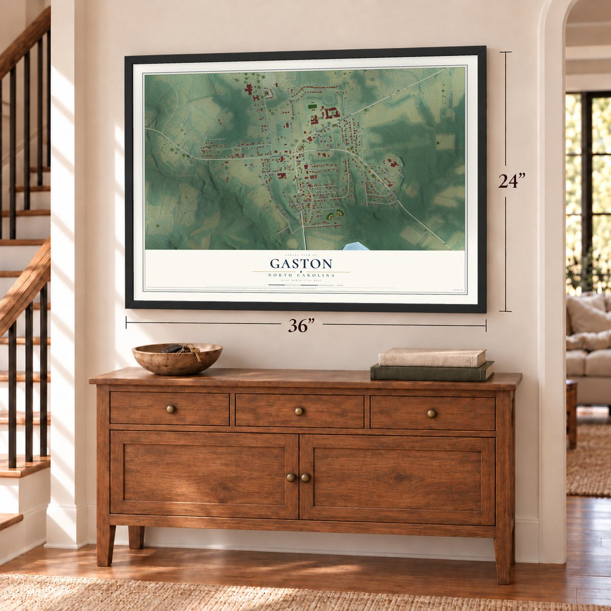 Gaston, North Carolina map, 24 x 36 inch print in a black frame above a dresser by a staircase