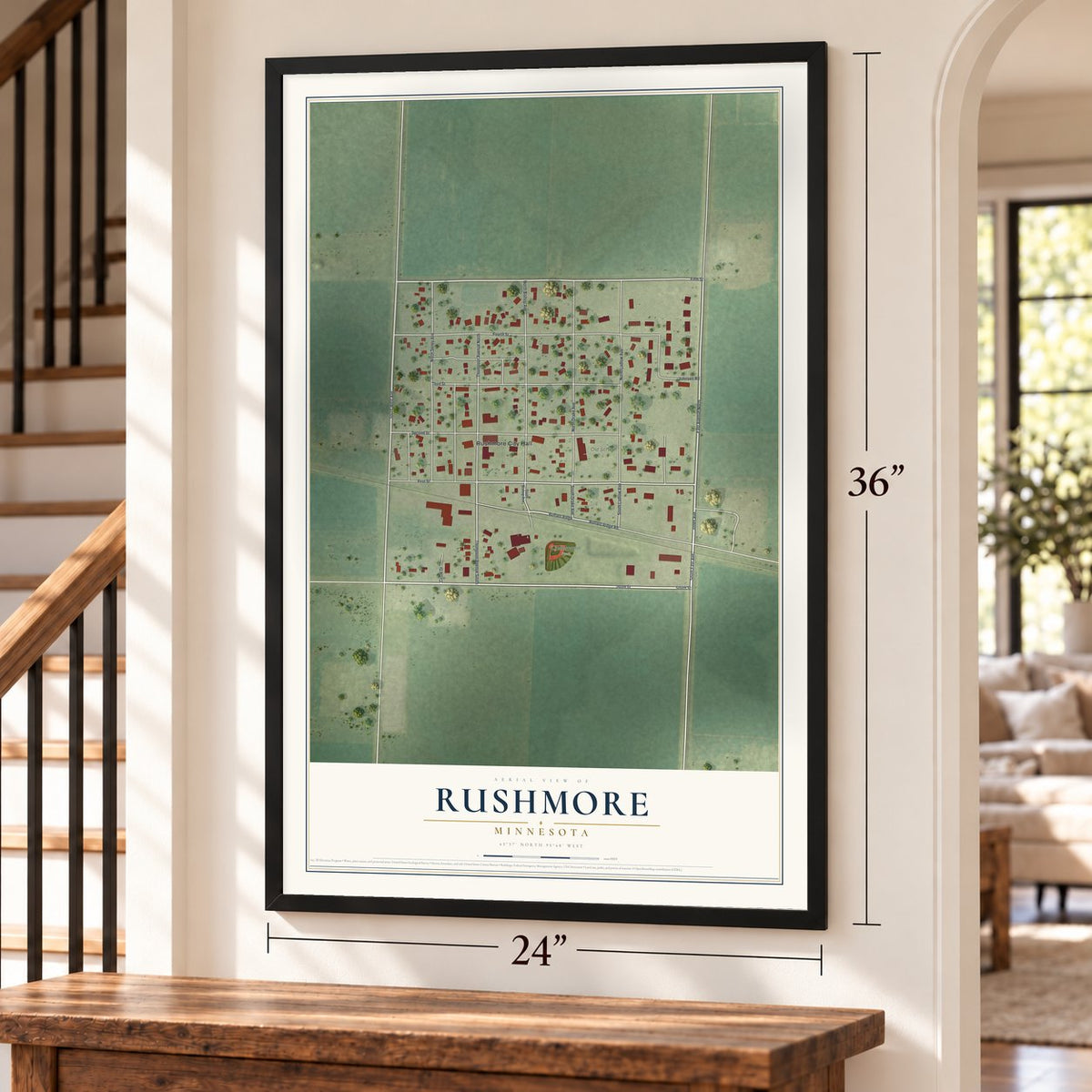Rushmore, Minnesota map, 24 x 36 inch print in a black frame by a staircase