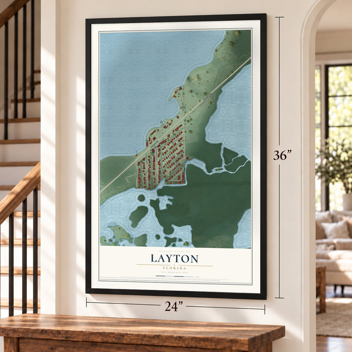 Layton, Florida map, 24 x 36 inch print in a black frame by a staircase