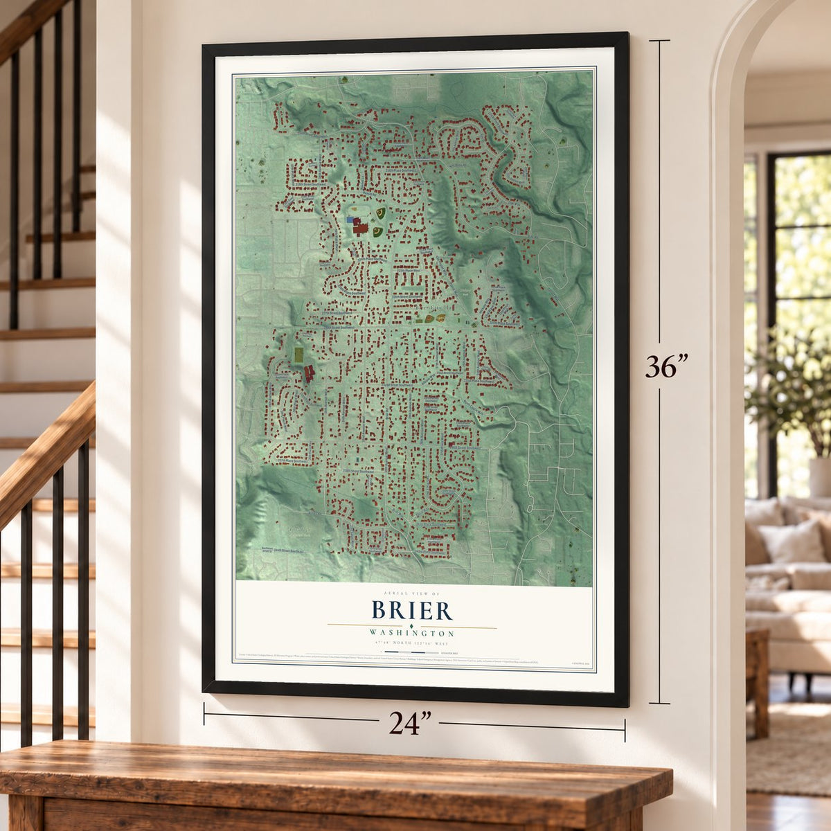 Brier, Washington map, 24 x 36 inch print in a black frame by a staircase