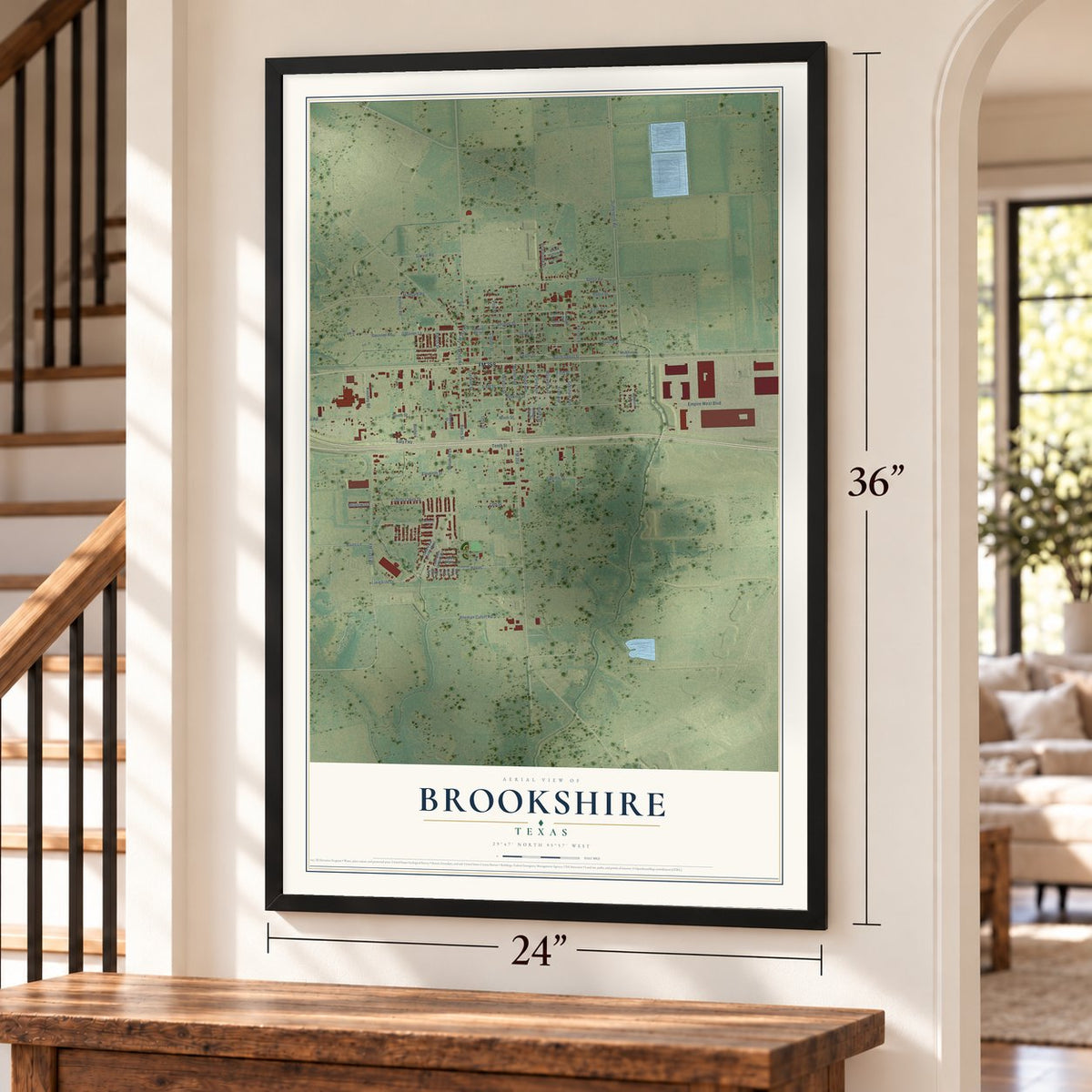Brookshire, Texas map, 24 x 36 inch print in a black frame by a staircase