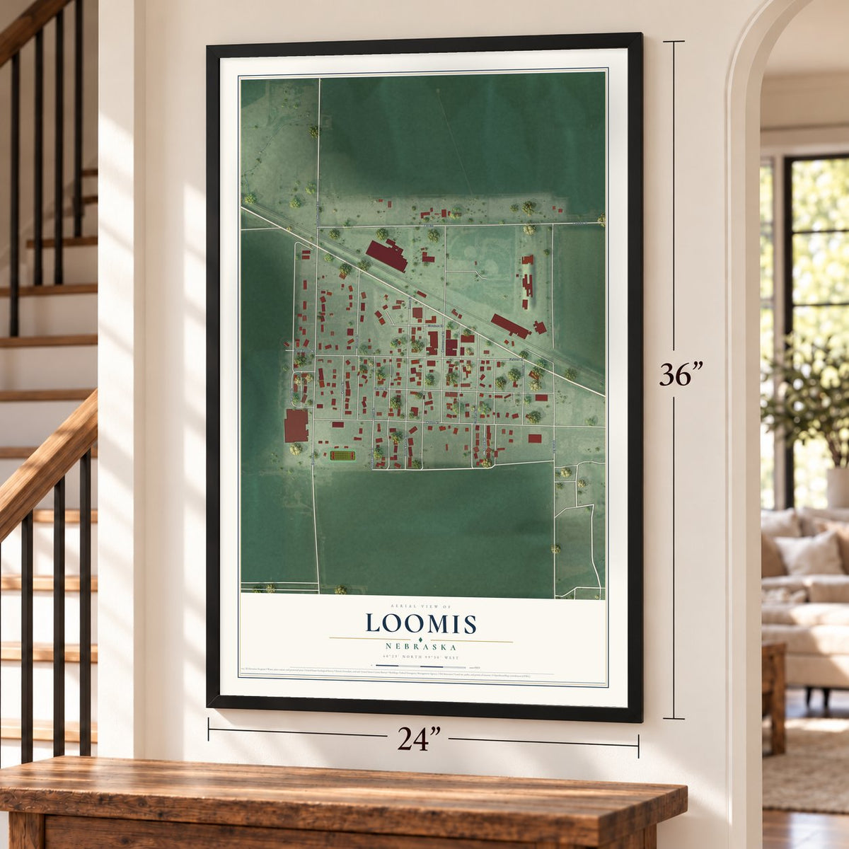 Loomis, Nebraska map, 24 x 36 inch print in a black frame by a staircase