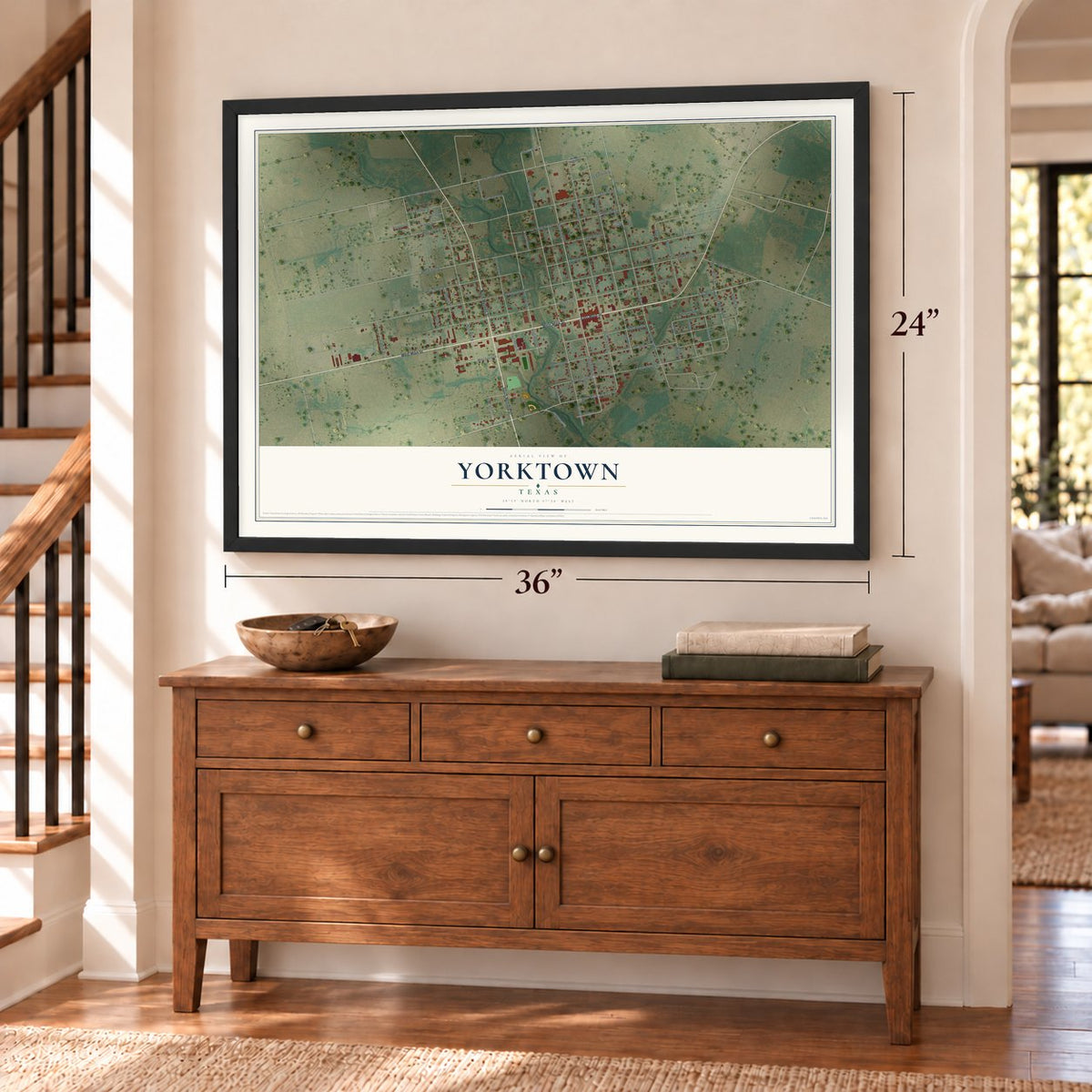 Yorktown, Texas map, 24 x 36 inch print in a black frame above a dresser by a staircase
