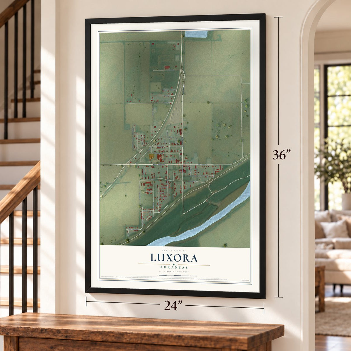 Luxora, Arkansas map, 24 x 36 inch print in a black frame by a staircase