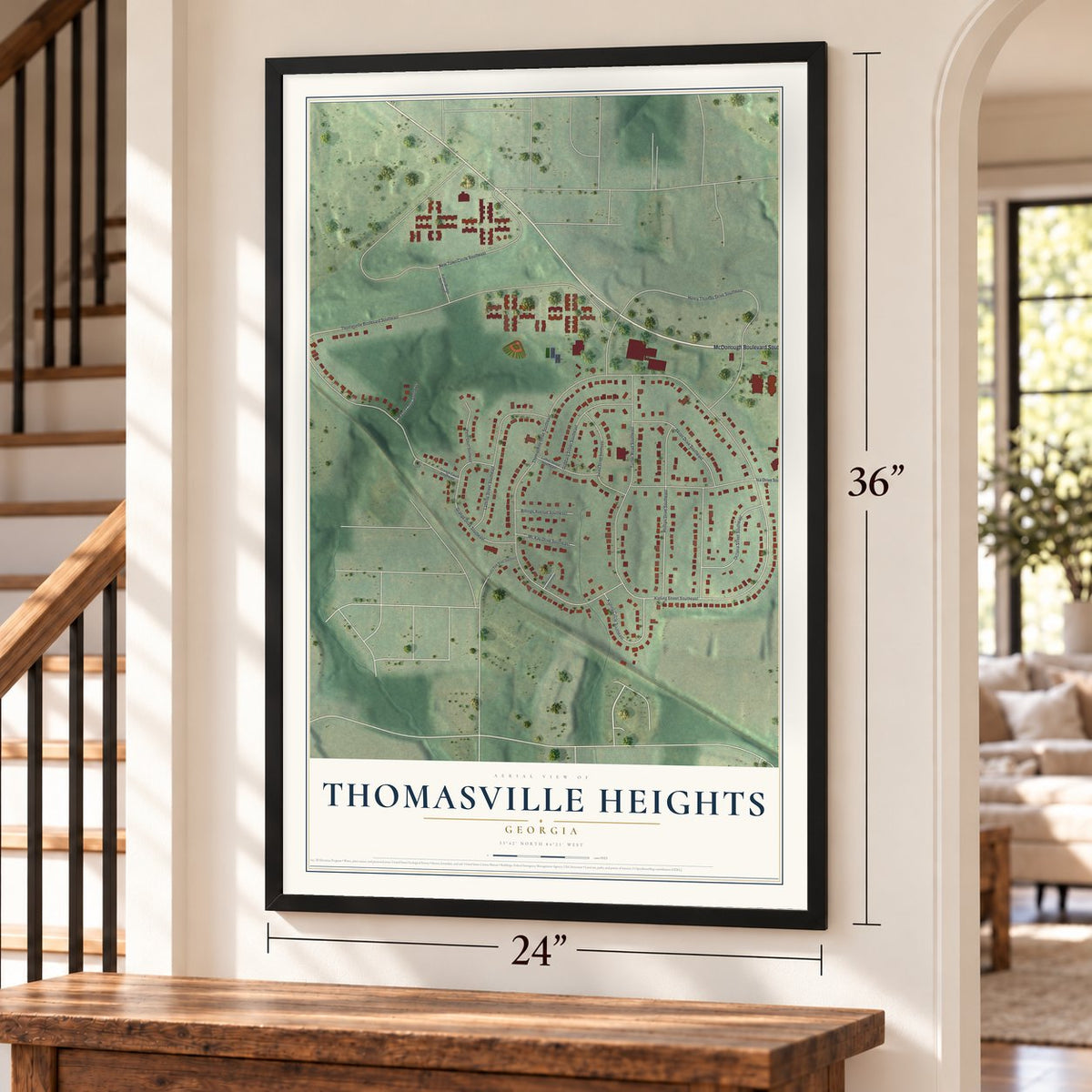 Thomasville Heights, Georgia map, 24 x 36 inch print in a black frame by a staircase