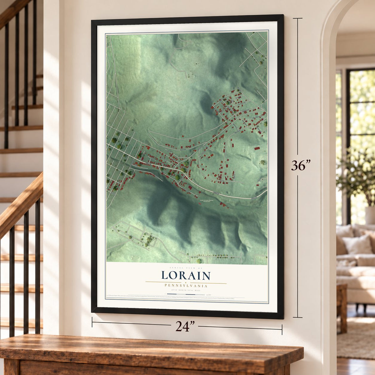 Lorain, Pennsylvania map, 24 x 36 inch print in a black frame by a staircase