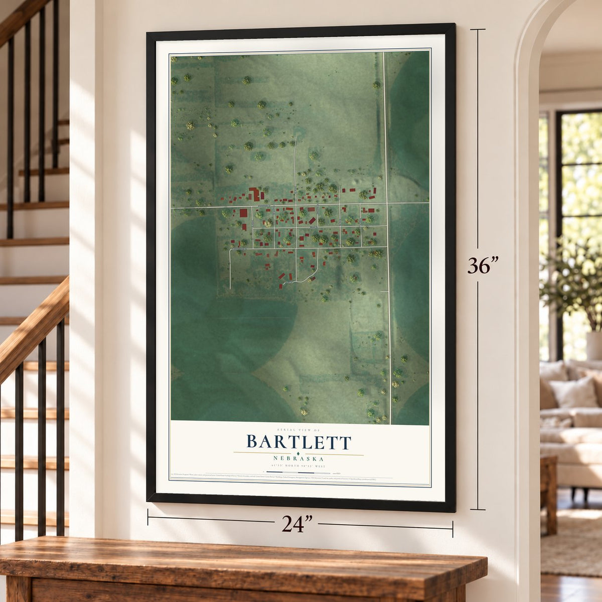 Bartlett, Nebraska map, 24 x 36 inch print in a black frame by a staircase