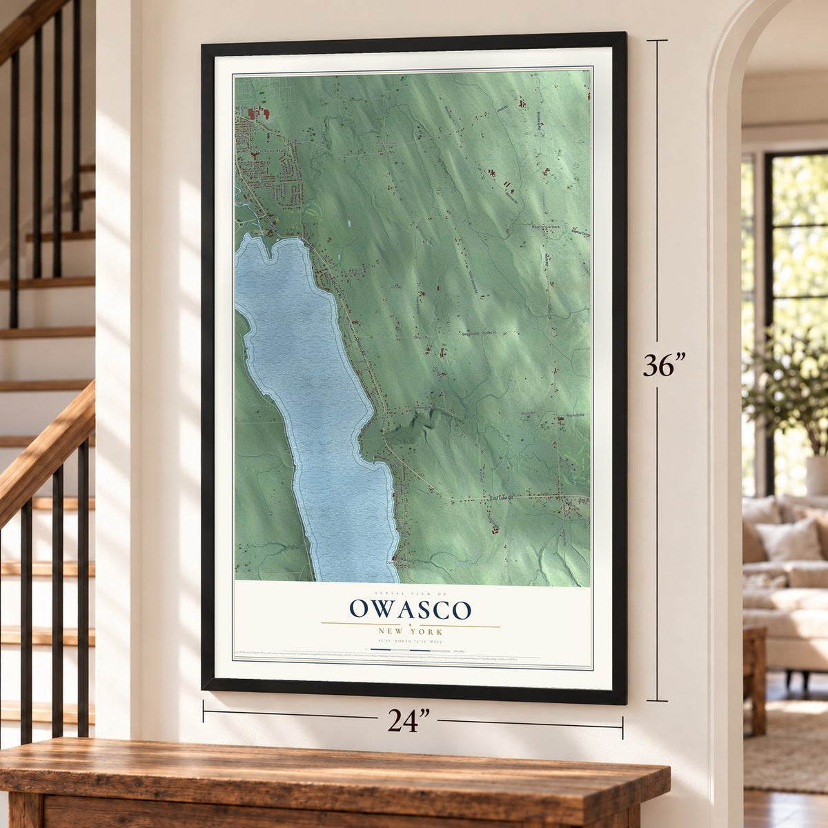 Owasco, New York map, 24 x 36 inch print in a black frame by a staircase