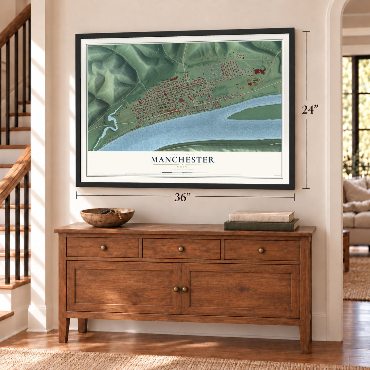 Manchester, Ohio map, 24 x 36 inch print in a black frame above a dresser by a staircase
