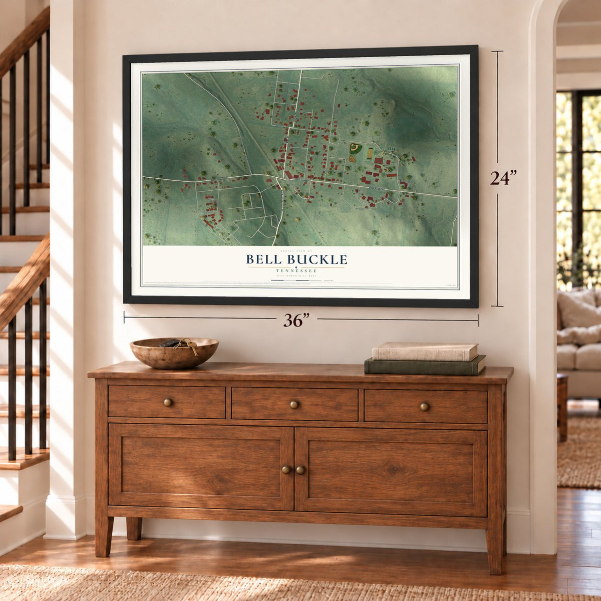 Bell Buckle, Tennessee map, 24 x 36 inch print in a black frame above a dresser by a staircase