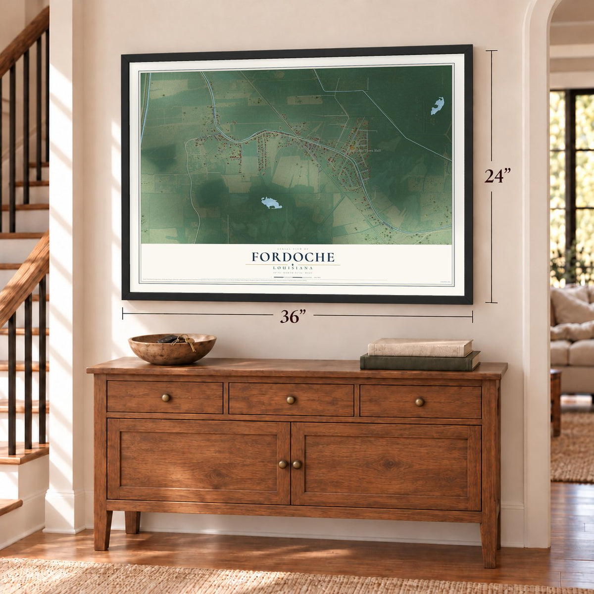 Fordoche, Louisiana map, 24 x 36 inch print in a black frame above a dresser by a staircase