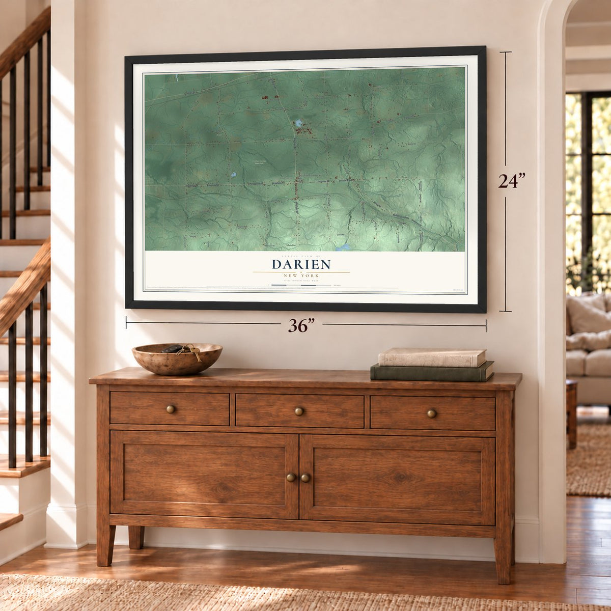 Darien, New York map, 24 x 36 inch print in a black frame above a dresser by a staircase