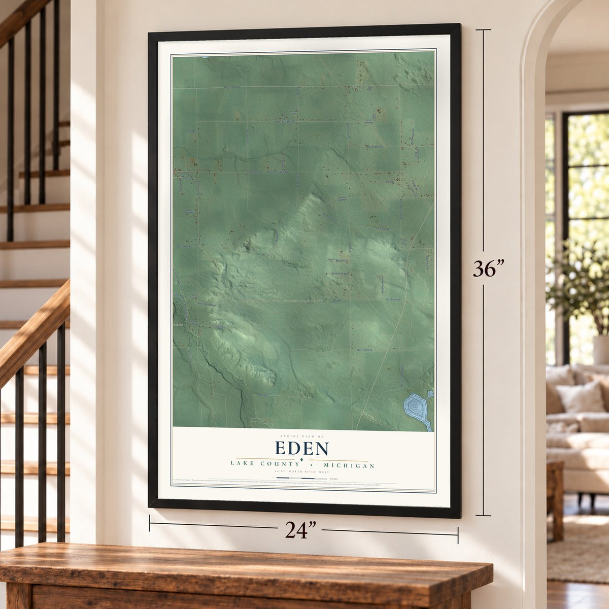 Eden, Lake County, Michigan map, 24 x 36 inch print in a black frame by a staircase