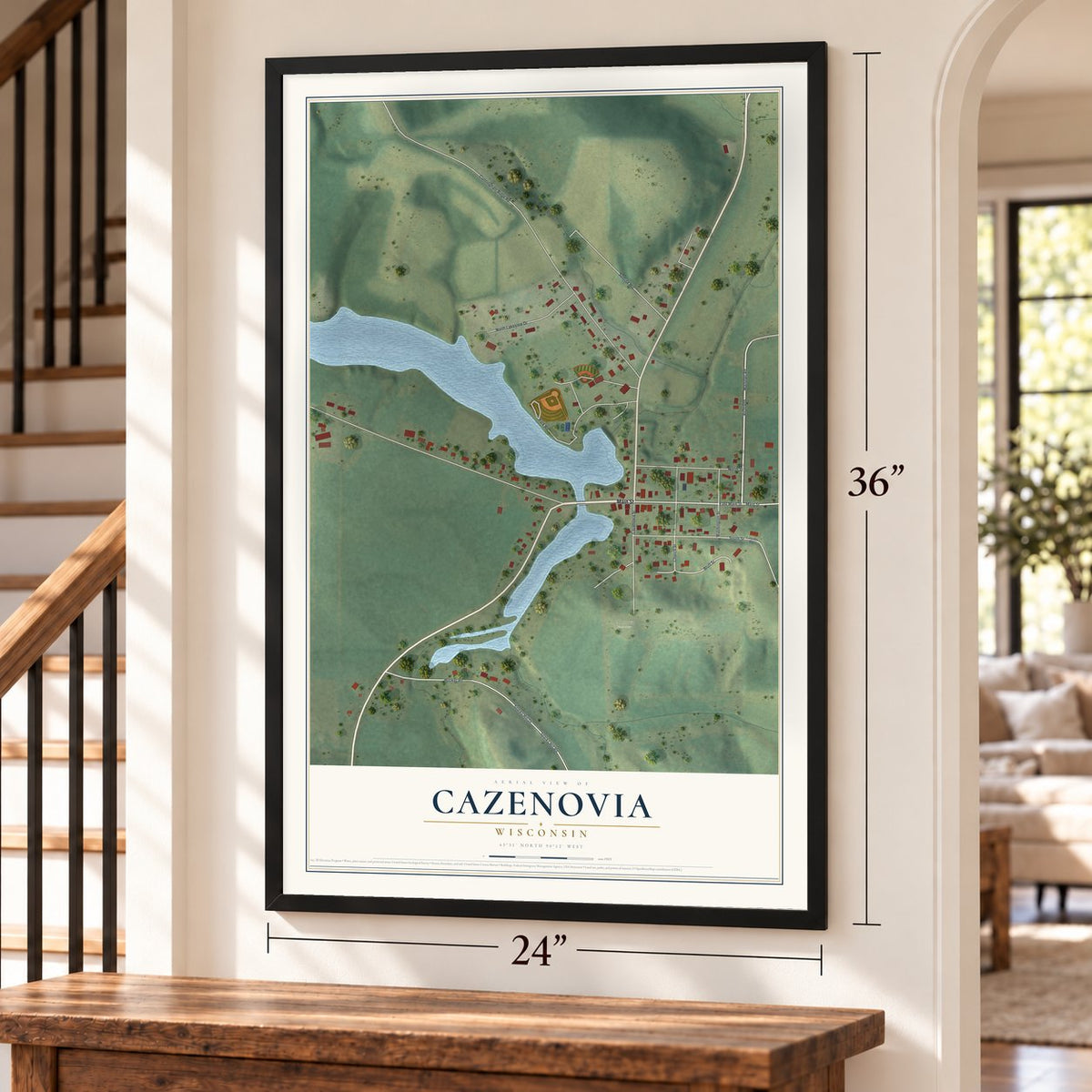 Cazenovia, Wisconsin map, 24 x 36 inch print in a black frame by a staircase