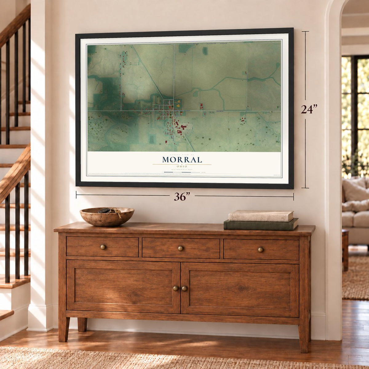 Morral, Ohio map, 24 x 36 inch print in a black frame above a dresser by a staircase