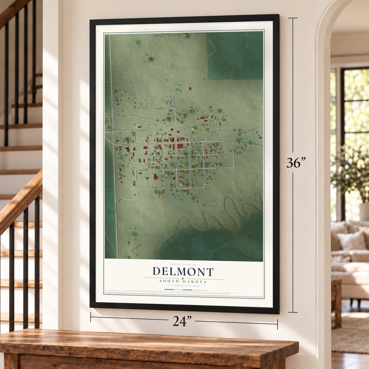 Delmont, South Dakota map, 24 x 36 inch print in a black frame by a staircase