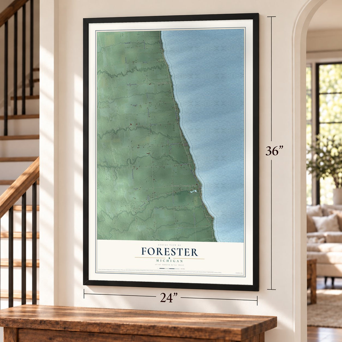 Forester, Michigan map, 24 x 36 inch print in a black frame by a staircase