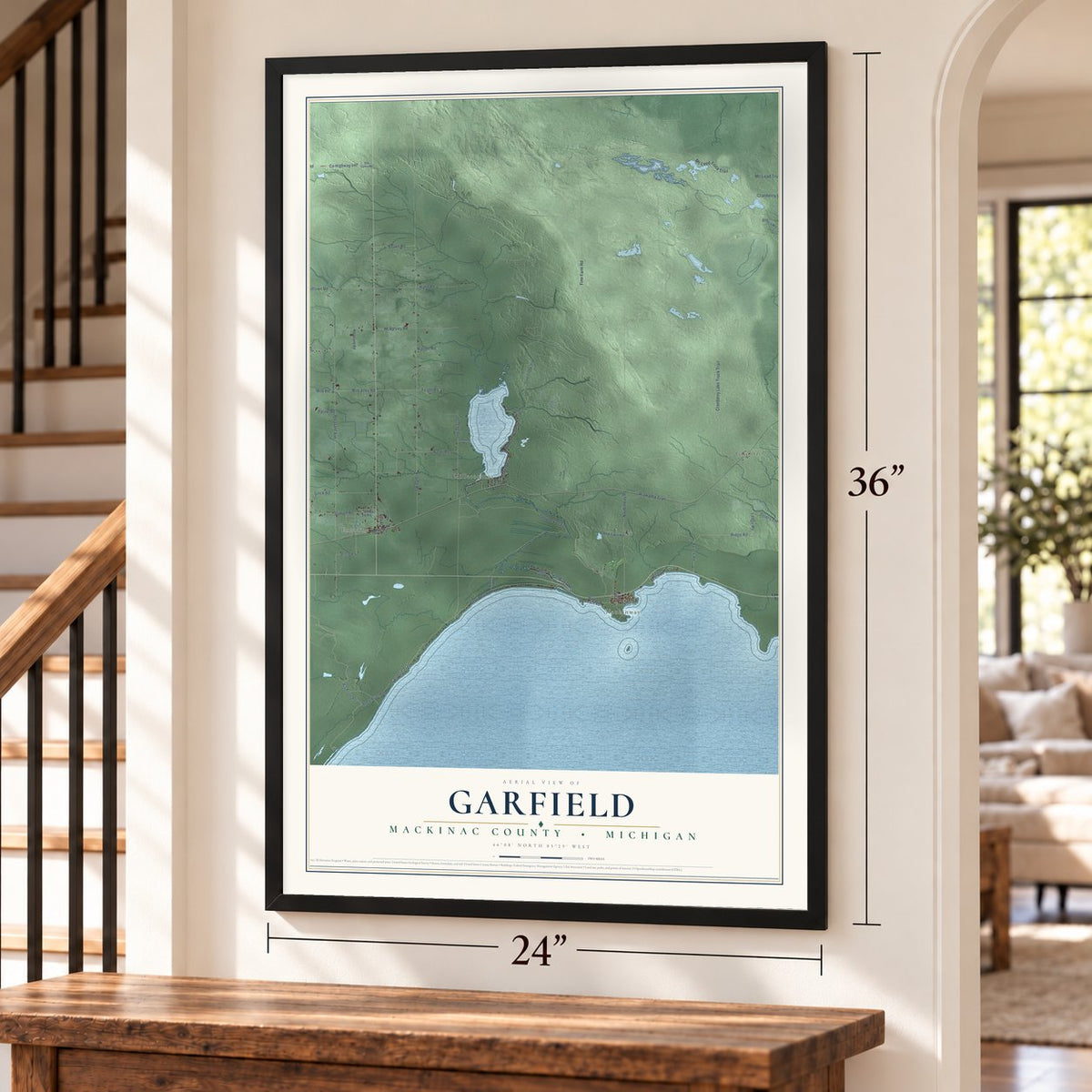 Garfield, Mackinac County, Michigan map, 24 x 36 inch print in a black frame by a staircase