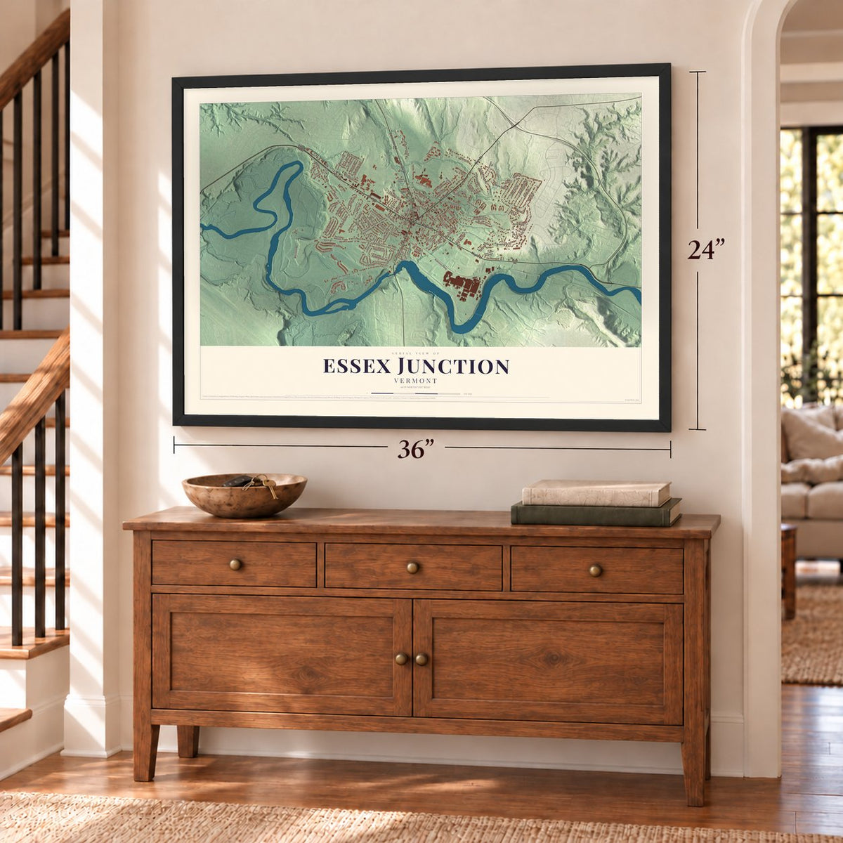 Essex Junction, Vermont map, 24 x 36 inch print in a black frame above a dresser by a staircase