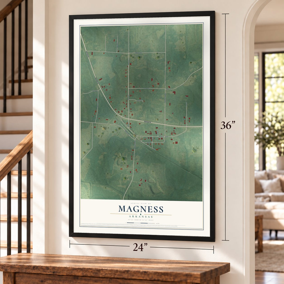 Magness, Arkansas map, 24 x 36 inch print in a black frame by a staircase