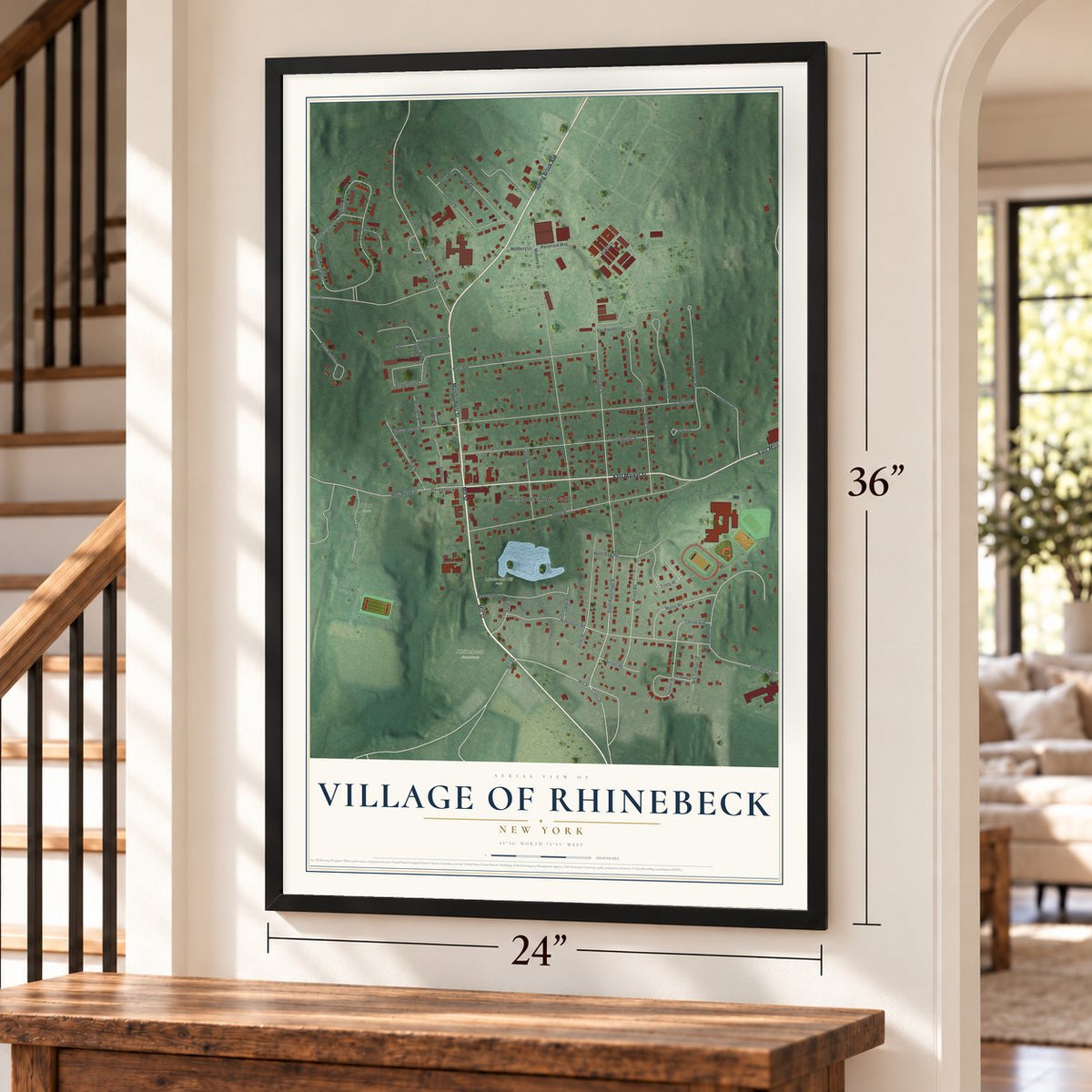 Village of Rhinebeck, New York map, 24 x 36 inch print in a black frame by a staircase