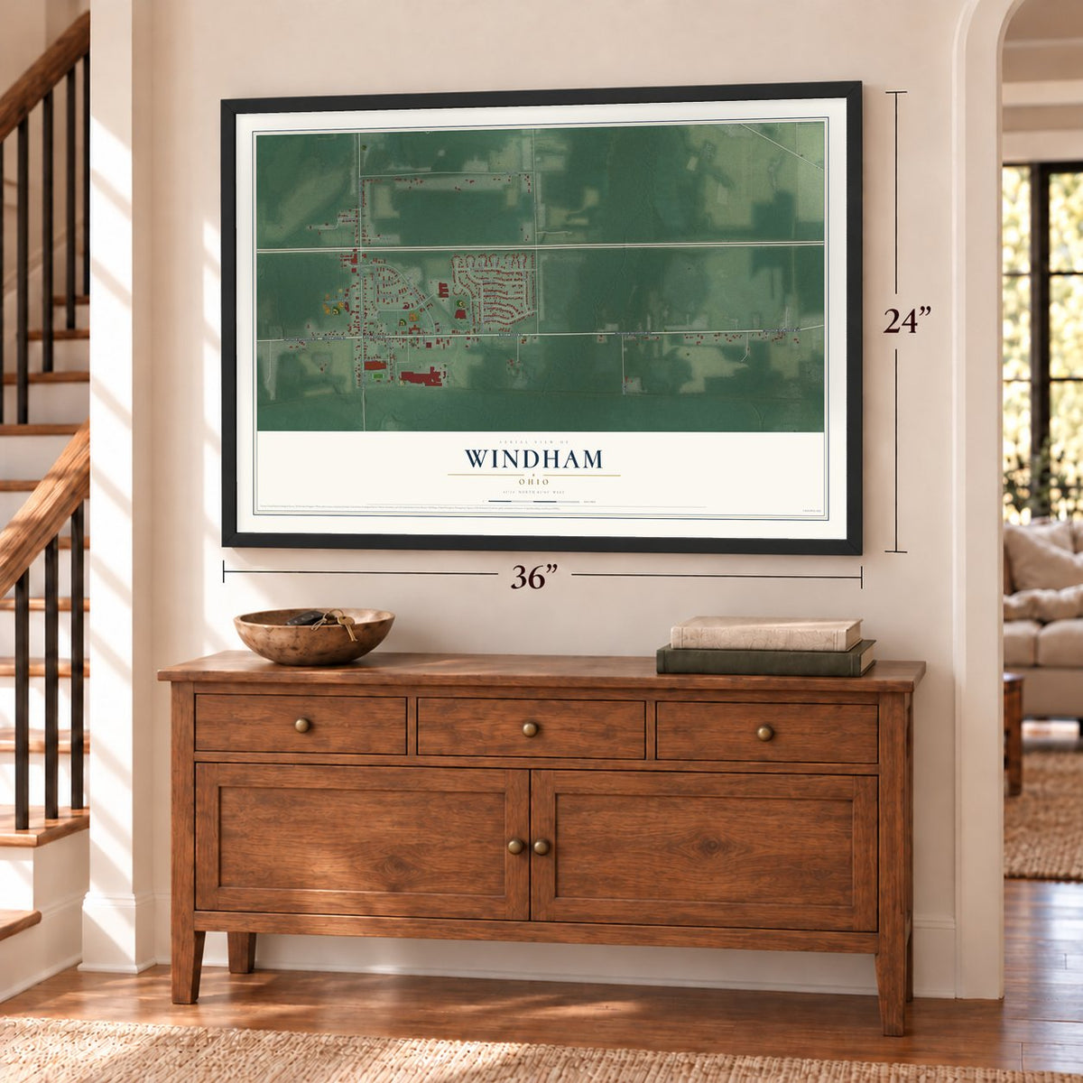 Windham, Ohio map, 24 x 36 inch print in a black frame above a dresser by a staircase